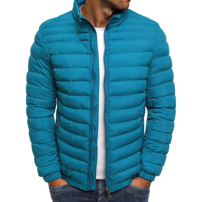 Men's thickened padded jacket with full-length zip, zipped pockets, and solid colour design in gray, black, or navy blue.