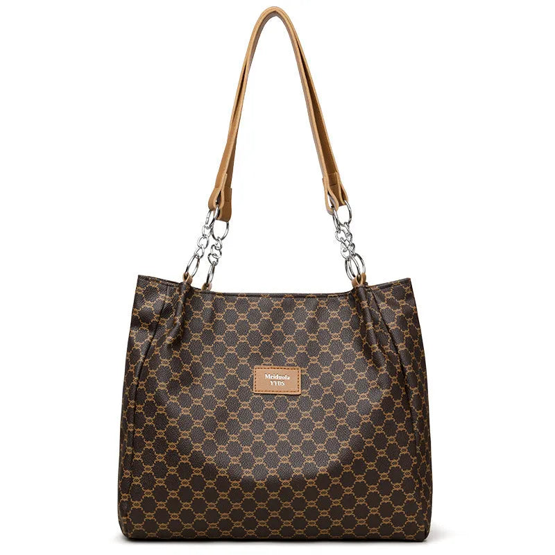 Women's retro fashion handbag in soft brown PU leather with shoulder strap.