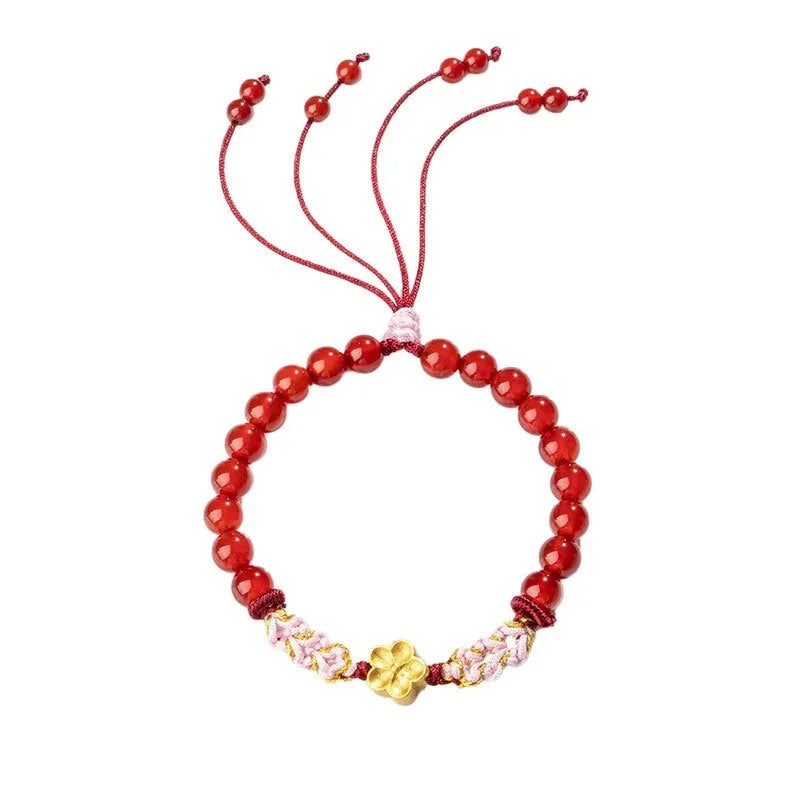 Chinese style peach blossom bracelet with hand-woven red rope strap and crystal centrepiece
