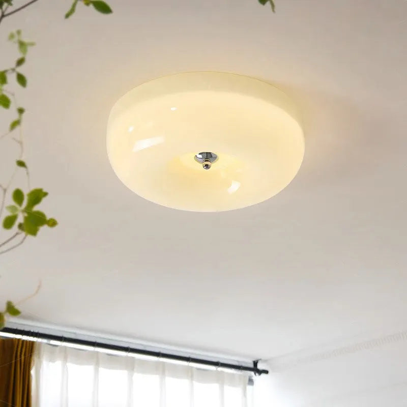 Cream coloured American style bedroom ceiling light with a three-colour light function.