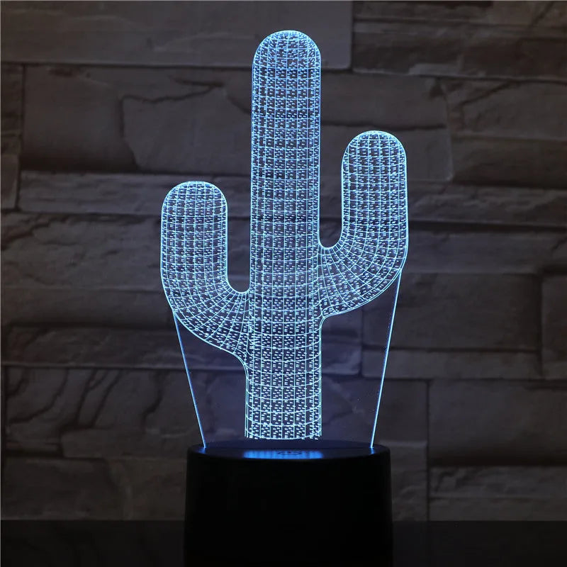 Cactus LED night light with 3D illusion board showing green glow on a table