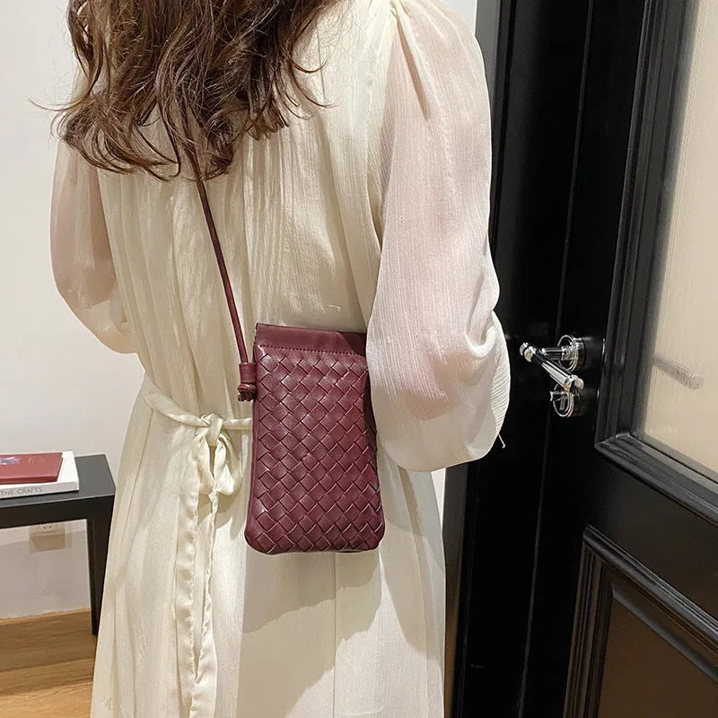 Vertical square PU crossbody bag with vintage weave texture in multiple colour options showing phone compartment.