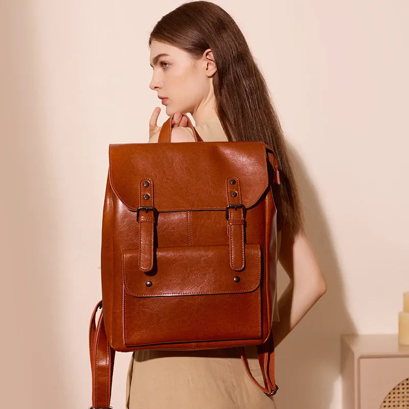 Genuine leather women's computer backpack in black, brown, and coffee brown colours