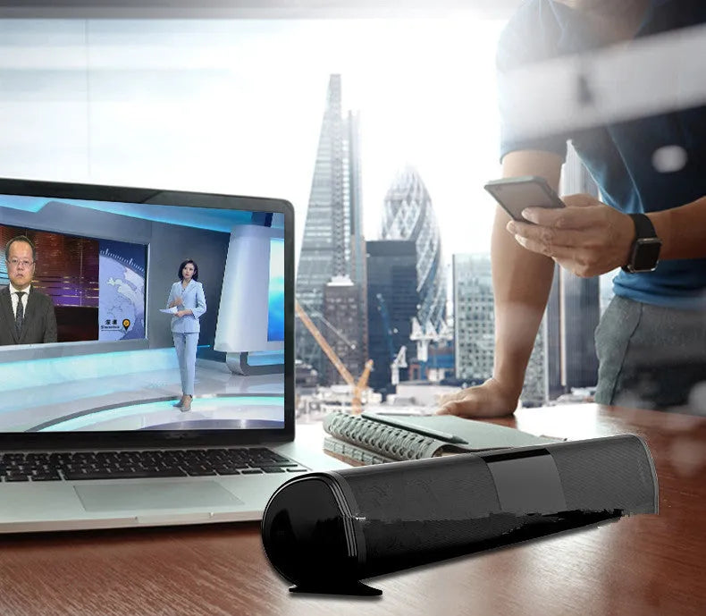 Black Bluetooth sound bar speaker measuring 58.5cm long with four speakers and button controls