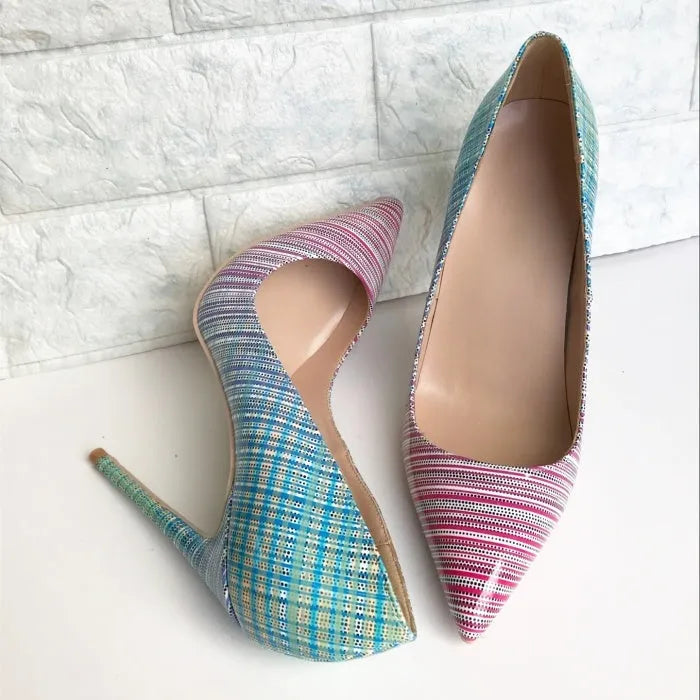 Ladies' pink-to-blue gradient patent leather high-heel shoe with a pointed toe on a rubber sole.