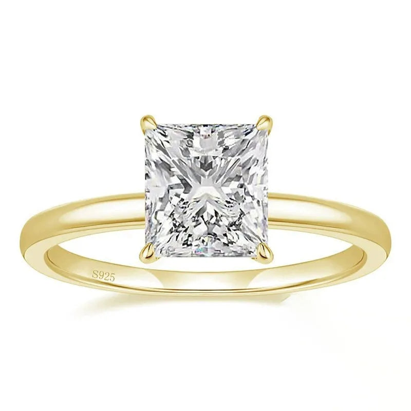 Sterling silver geometric women's ring with a round zirconia stone in silver, gold, or rose gold finish.