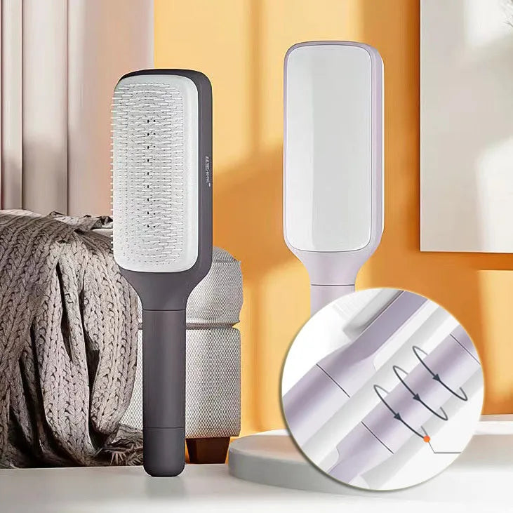 Purple and grey self-cleaning hair brushes with rotating handles and anti-static teeth.