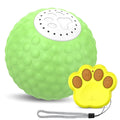 Blue electronic cat ball toy with remote control on a wooden floor.