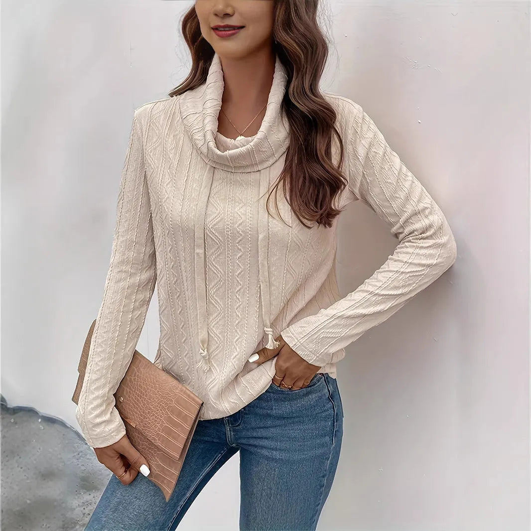 Apricot coloured hooded pullover sweater with long sleeves and drawstring waist