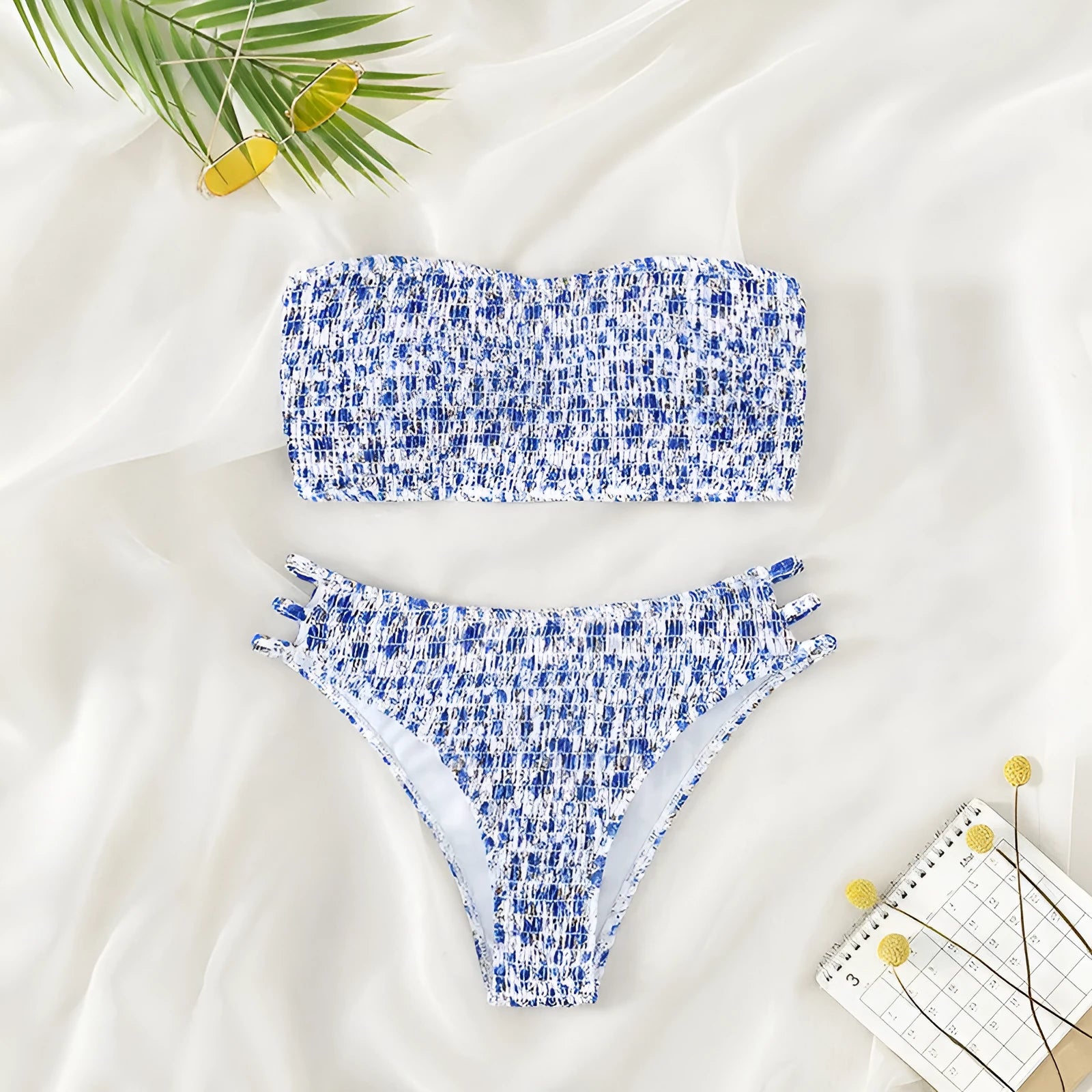 Women's strapless floral print swimsuit with high waist briefs and beauty back design.