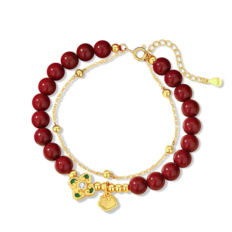 Sterling silver women's bracelet with geometric design featuring Ruyi, Xiangyun motifs and cinnabar flower detail.