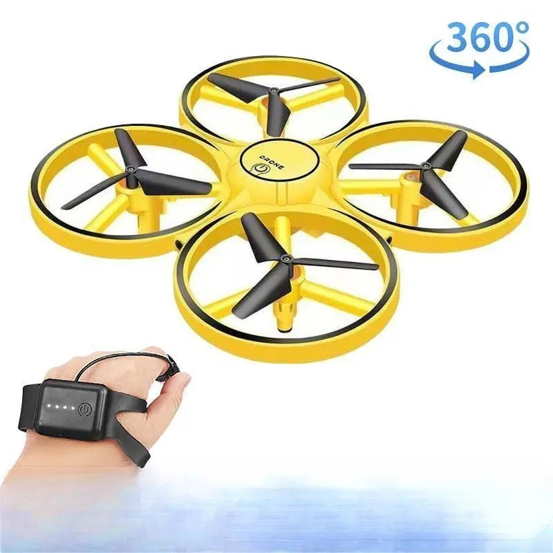 Gesture sensing flying saucer toy with ABS plastic body and four-axis design on white background