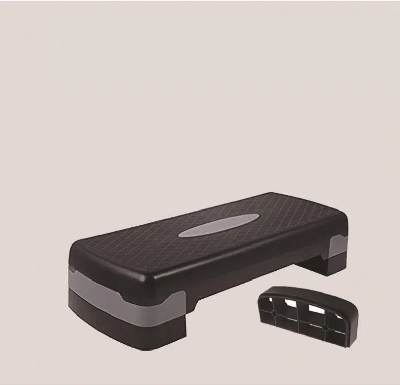 Aerobic fitness step pedal in PP material, 68 x 28 x 15cm, shown in Black and Blue or Grey.