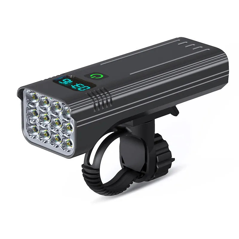 Black KX12DF digital display bicycle headlight mounted on a quick-release bracket with USB cable.