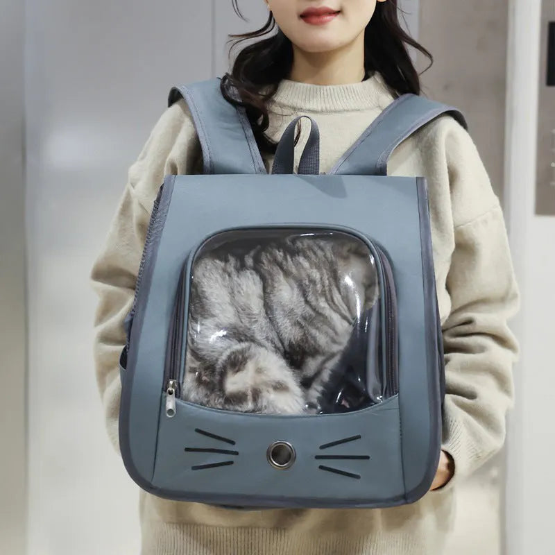 Pet cat carrier backpack in blue Oxford fabric with mesh top and shoulder straps