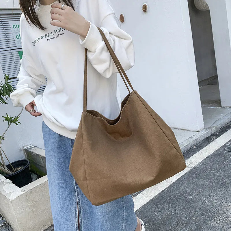 Women's solid colour canvas shopping bag with double shoulder straps and internal mobile phone pocket