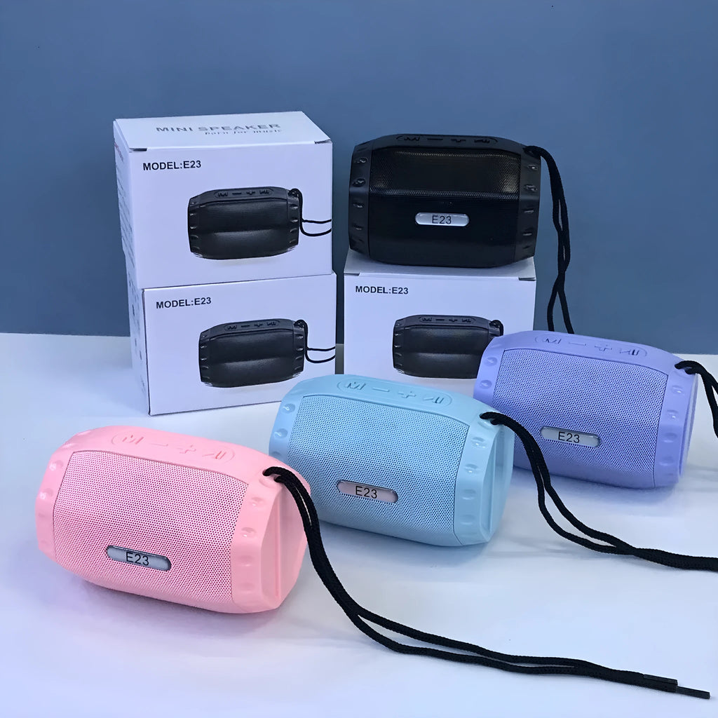 Small portable Bluetooth speaker with USB connectivity in black, blue, pink, or purple colour options