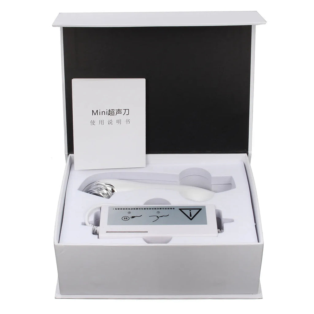 Mini ultrasonic scalpel for home facial firming in purple, with power adapter and gel on white background