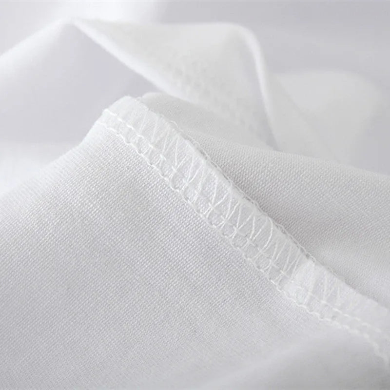 White modal t-shirt with banana peel print on the front, shown against a plain background