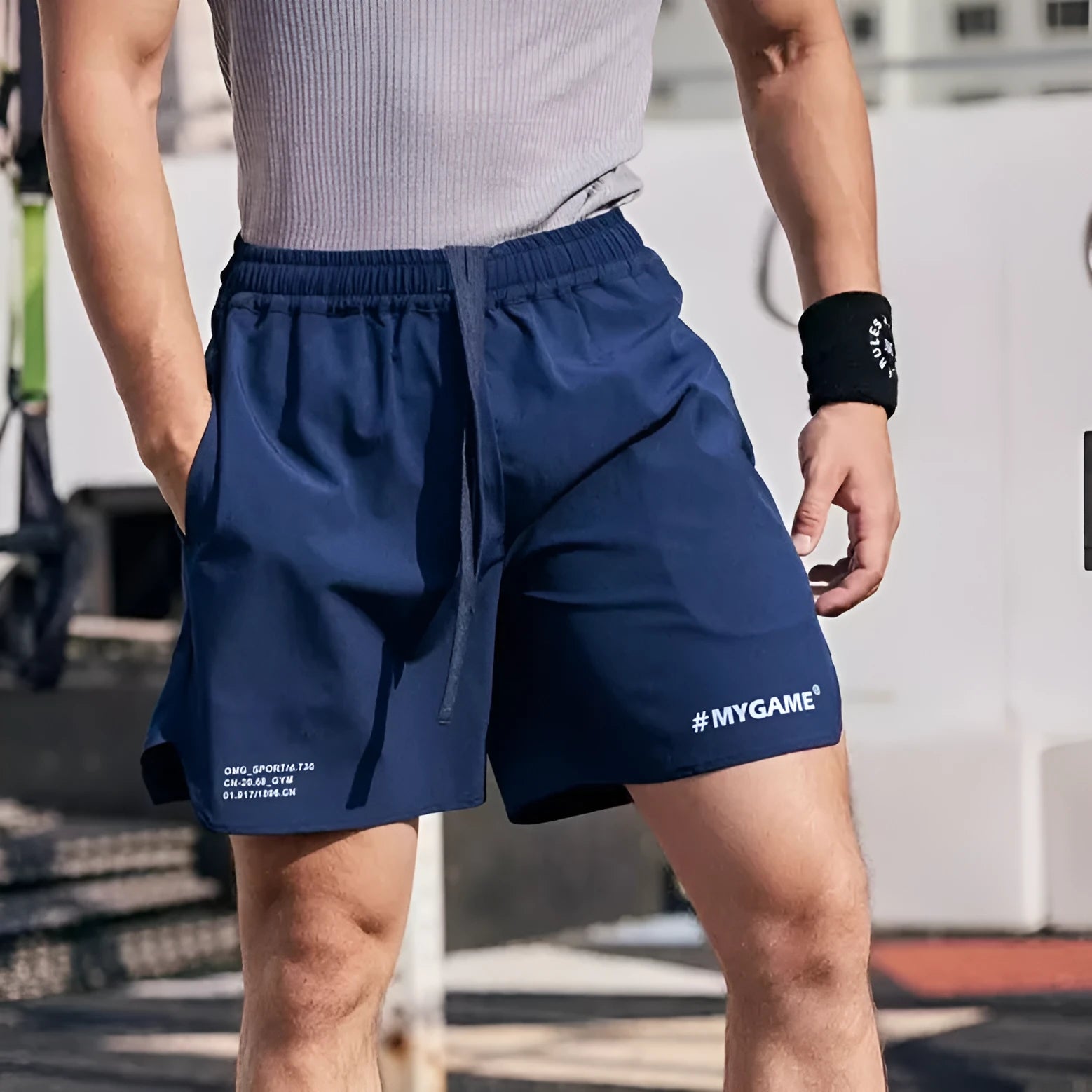 Men's grey quick-dry fitness shorts with a short-length cut for training.