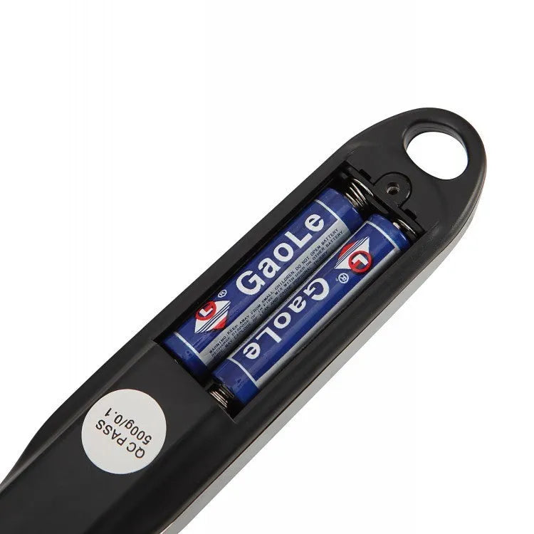Smart digital measuring spoon kitchen scale with LCD display showing weight measurement