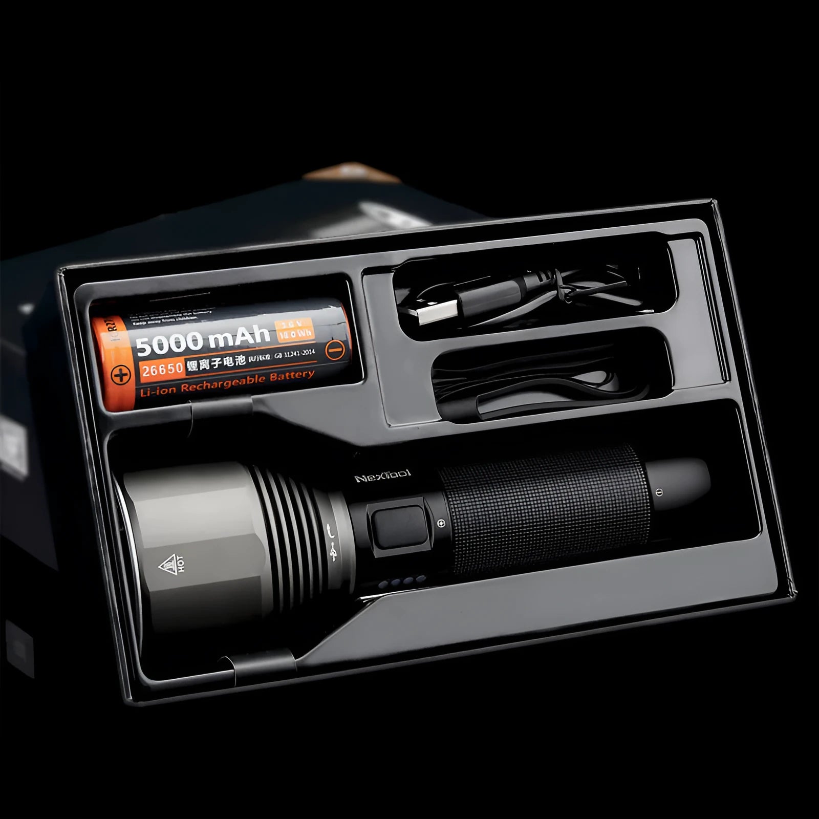 Black rechargeable outdoor flashlight showing aluminium construction with measurement indicators