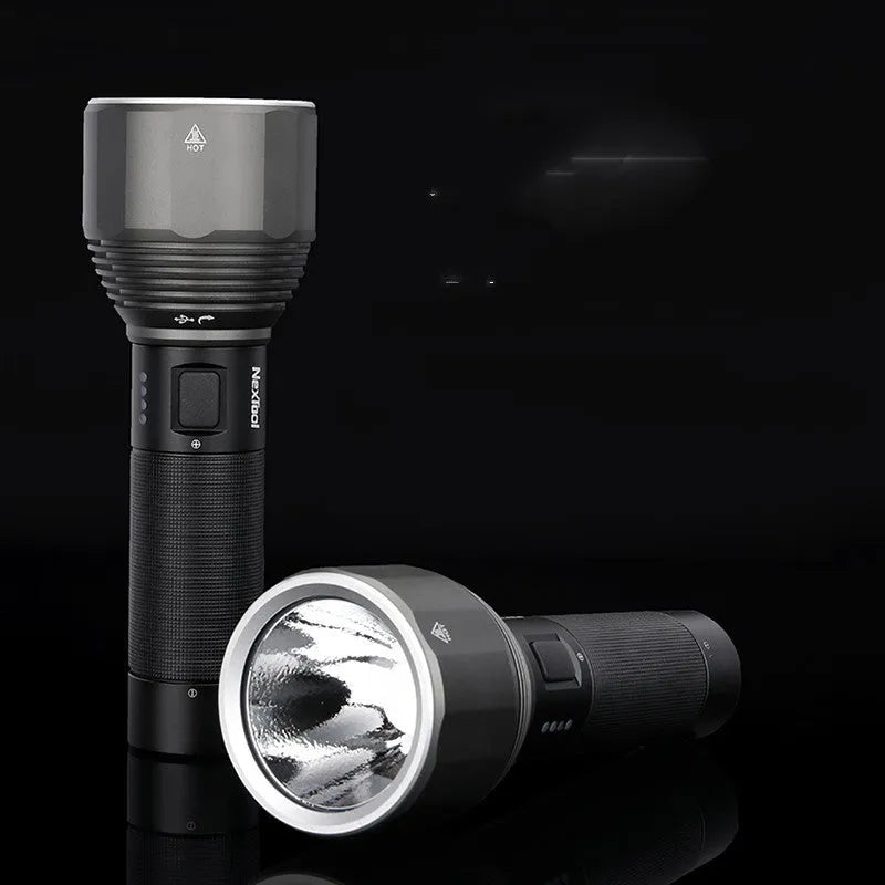 Black rechargeable outdoor flashlight showing aluminium construction with measurement indicators