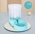 Plastic automatic pet waterer and feeder for cats and small dogs, shown in azure, pretty powder and solid grey