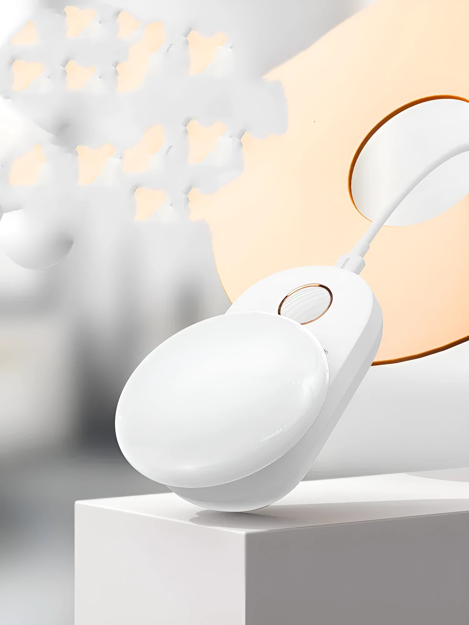 White Baseus Sunshine Series rechargeable LED night light with motion sensor on a bedside table.