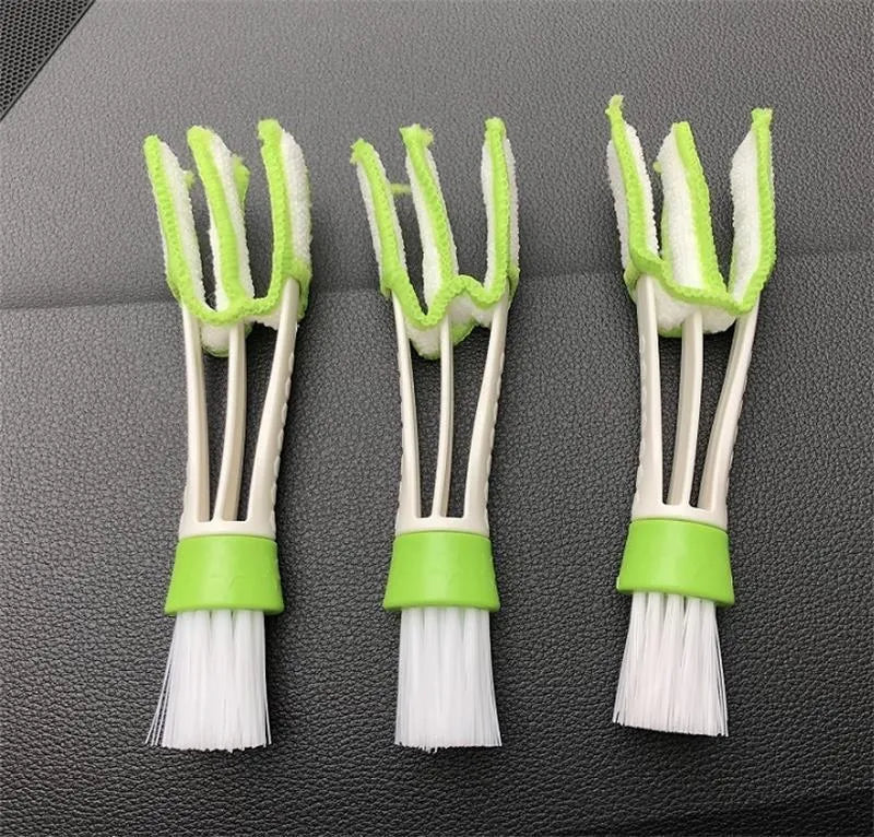 Green car dust removal brush with soft bristles and removable microfibre cloth cover for dashboard and air vent cleaning
