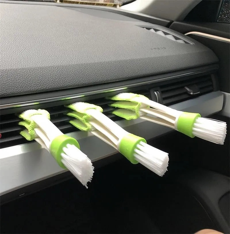 Green car dust removal brush with soft bristles and removable microfibre cloth cover for dashboard and air vent cleaning