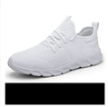 Men's black and white lace-up casual sneaker with mesh upper on a PVC sole.