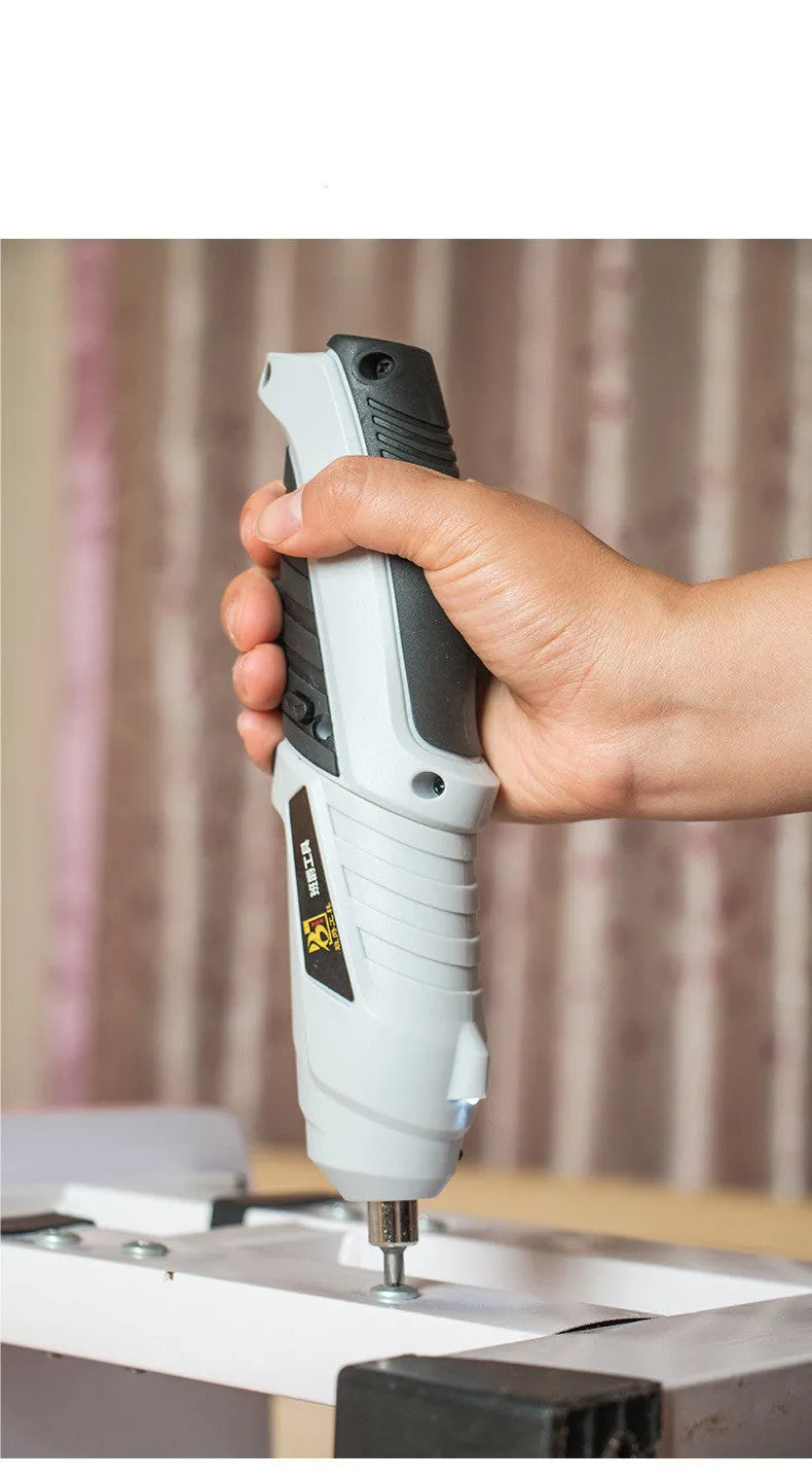 Black pistol grip rechargeable screwdriver with USB charging port and accessory bits for furniture assembly