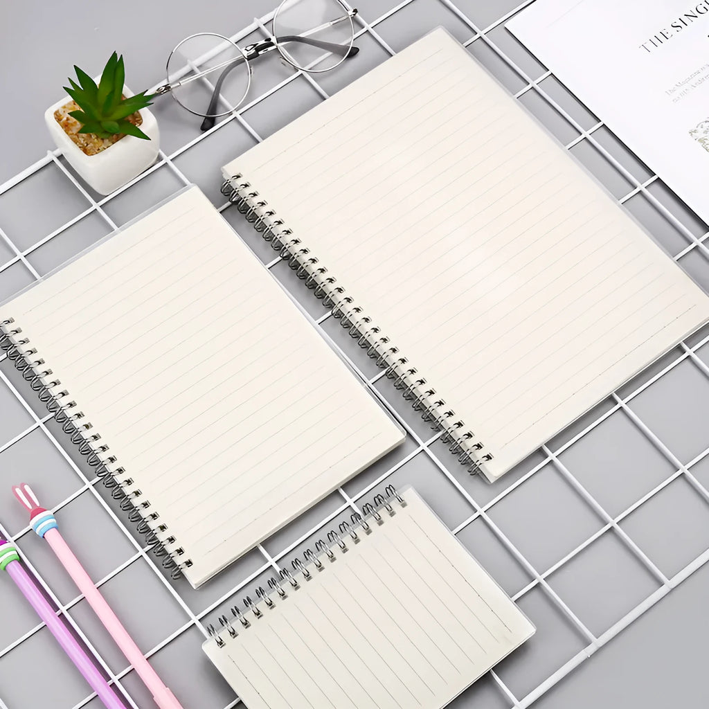 Creative coil-bound notebook open showing grid dot matrix pages, with PP matte cover in A5 size.