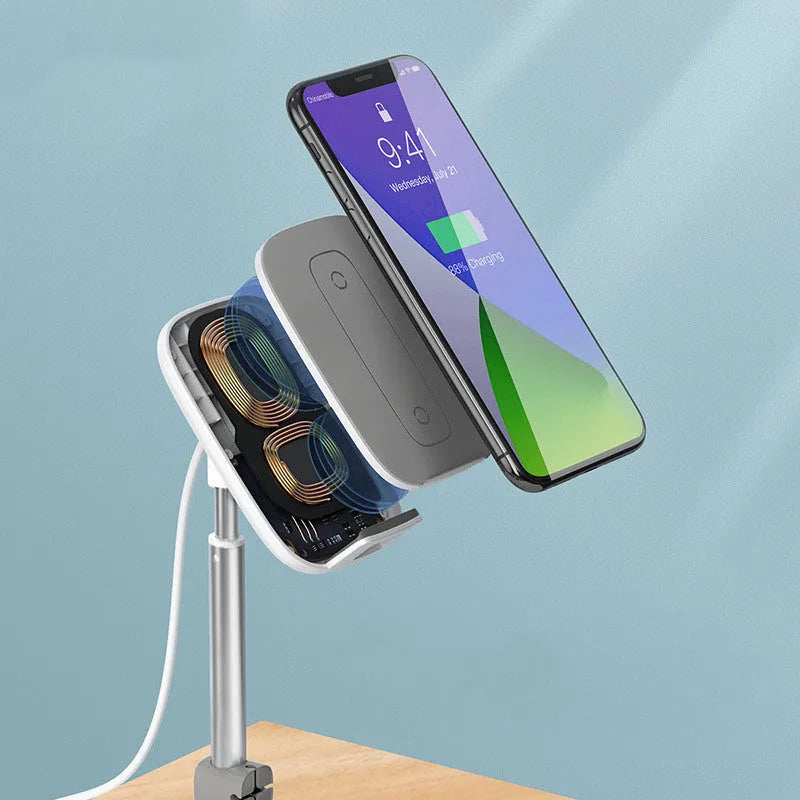 Baseus 15W wireless charger stand in silver holding a smartphone on a desk