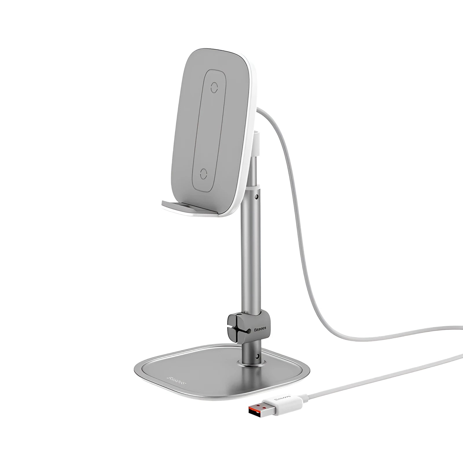Baseus 15W wireless charger stand in silver holding a smartphone on a desk
