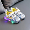 Kids' black breathable mesh sneakers with Velcro strap and rubber sole