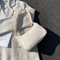 Women's one-shoulder horizontal square PU armpit bag with zipper closure and phone pocket, colour-contrast design