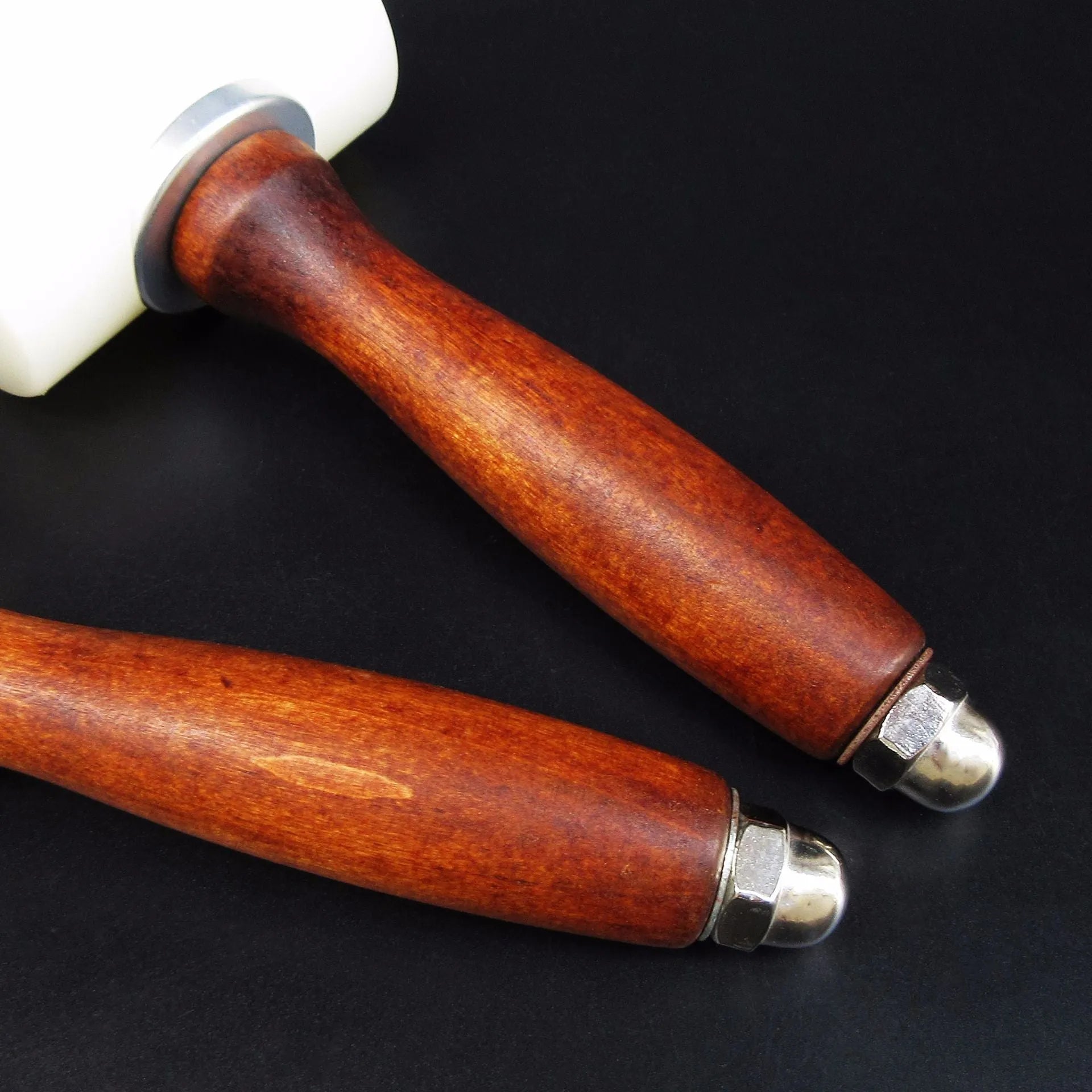 T-shaped leather carving hammer with white nylon head and brown wooden handle for leathercraft