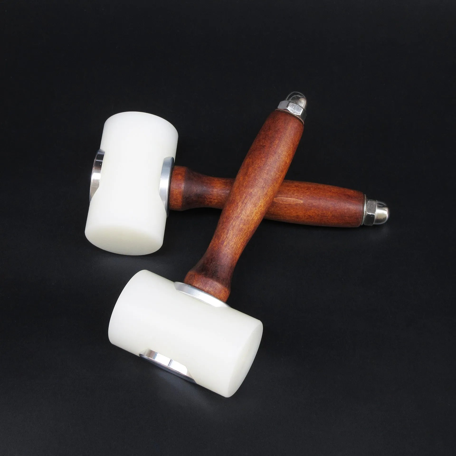 T-shaped leather carving hammer with white nylon head and brown wooden handle for leathercraft