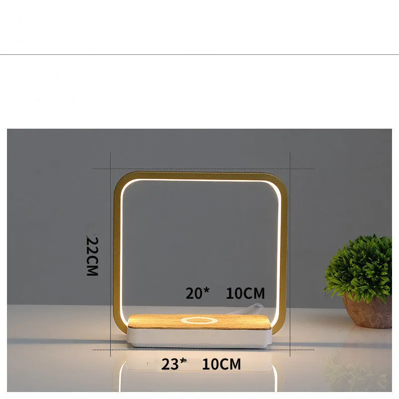 Modern smart touch sensor bedside lamp with aluminium shade in white, showing USB cable.