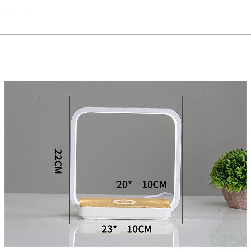 Modern smart touch sensor bedside lamp with aluminium shade in white, showing USB cable.