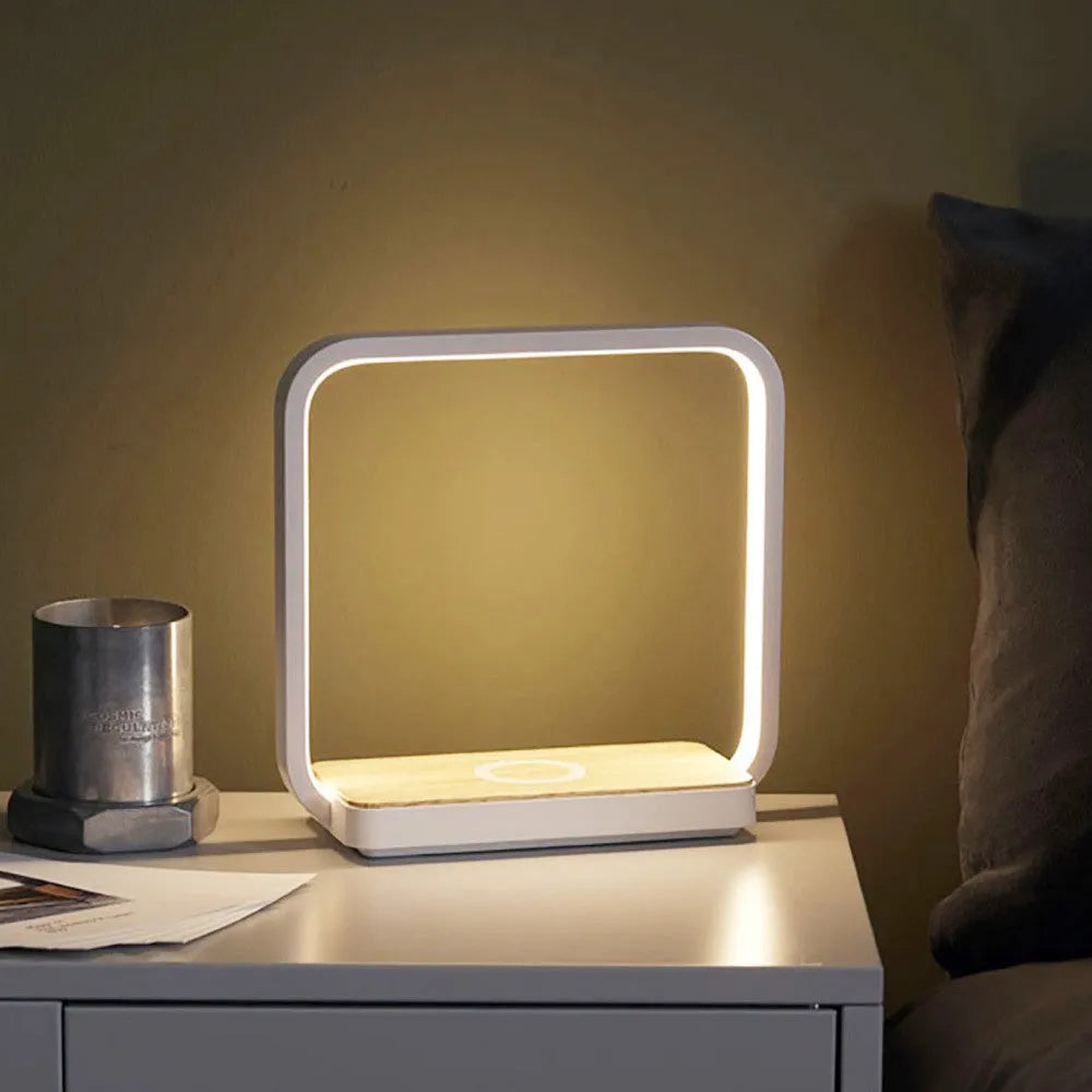 Modern smart touch sensor bedside lamp with aluminium shade in white, showing USB cable.