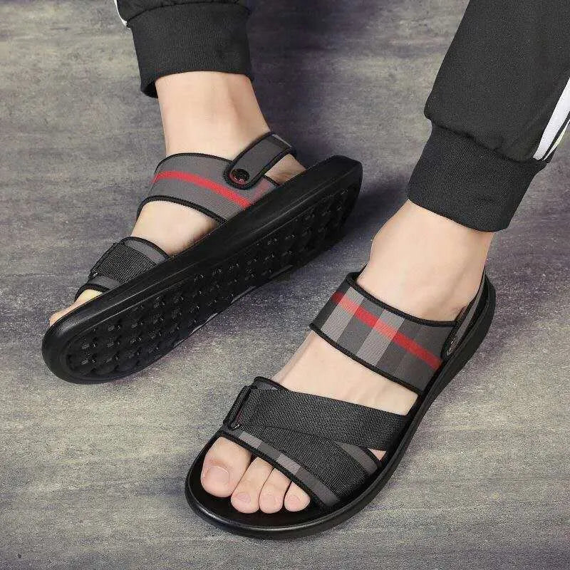 Pair of youth sports sandals with a blue Lycra upper and light polyurethane sole.