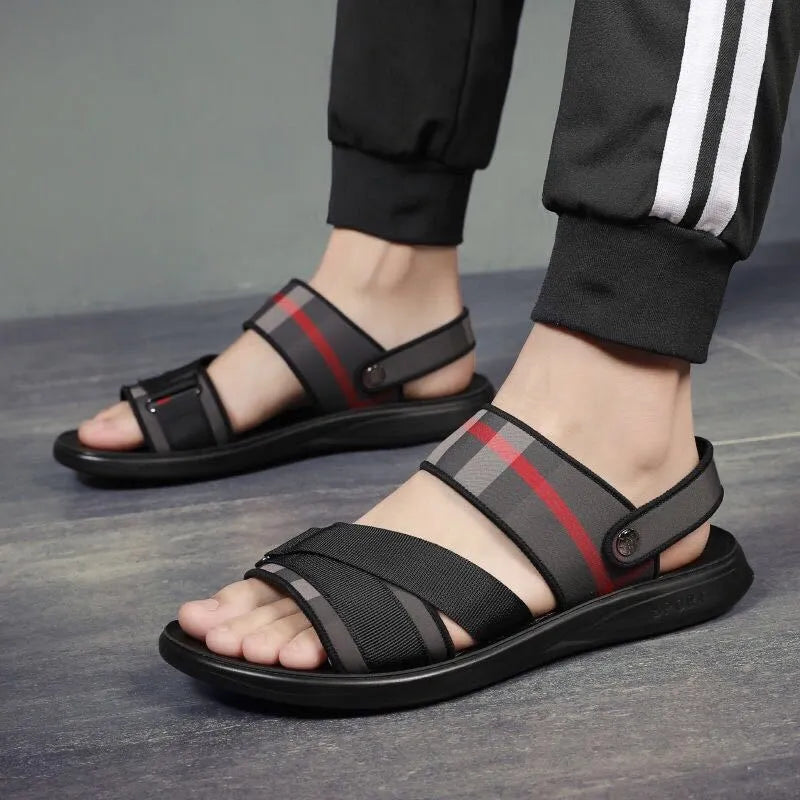 Pair of youth sports sandals with a blue Lycra upper and light polyurethane sole.
