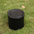 Portable car folding toilet in grey, oval shape, folded for storage