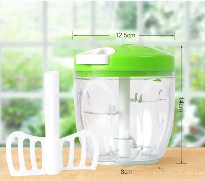 Green manual kitchen chopper with three stainless steel blades inside a clear 500ml bowl.