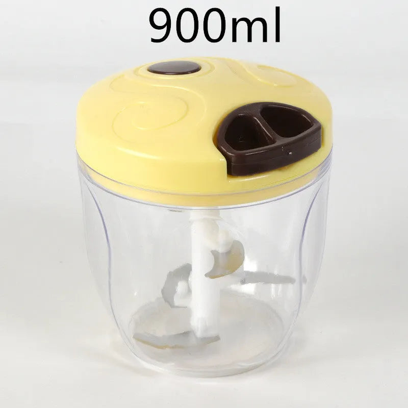 Green manual kitchen chopper with three stainless steel blades inside a clear 500ml bowl.