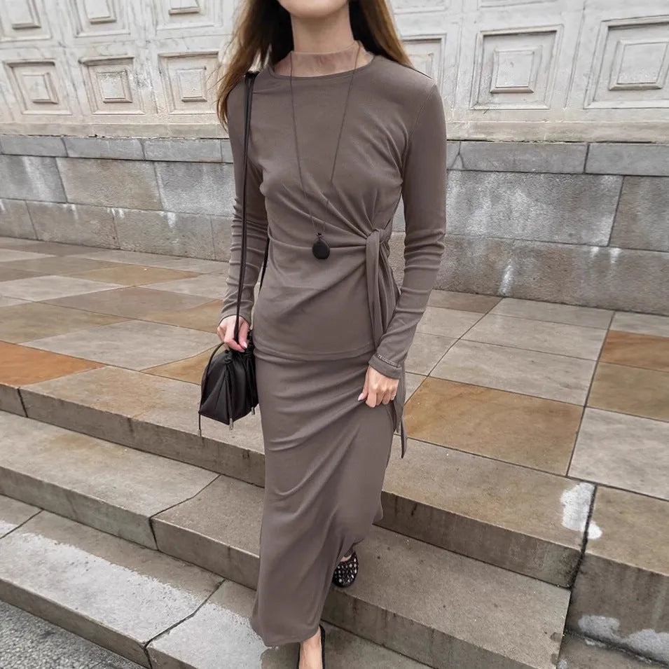 Women's two-piece dress set in khaki with retro crew neck and lace-up front, long sleeves and matching skirt
