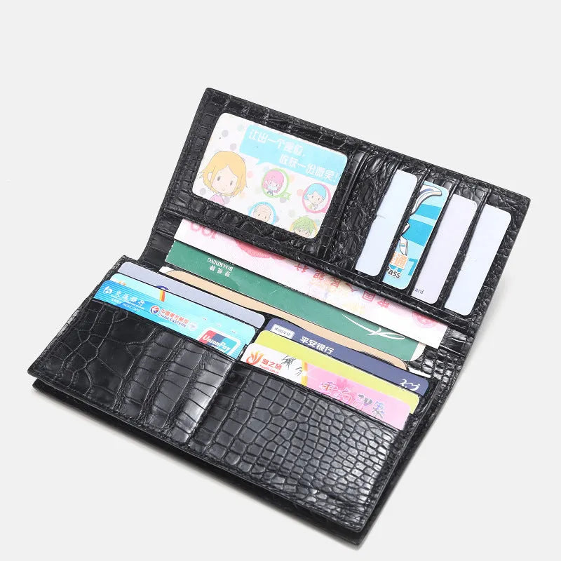 Men's long black crocodile leather bifold wallet with multiple card slots and change pocket